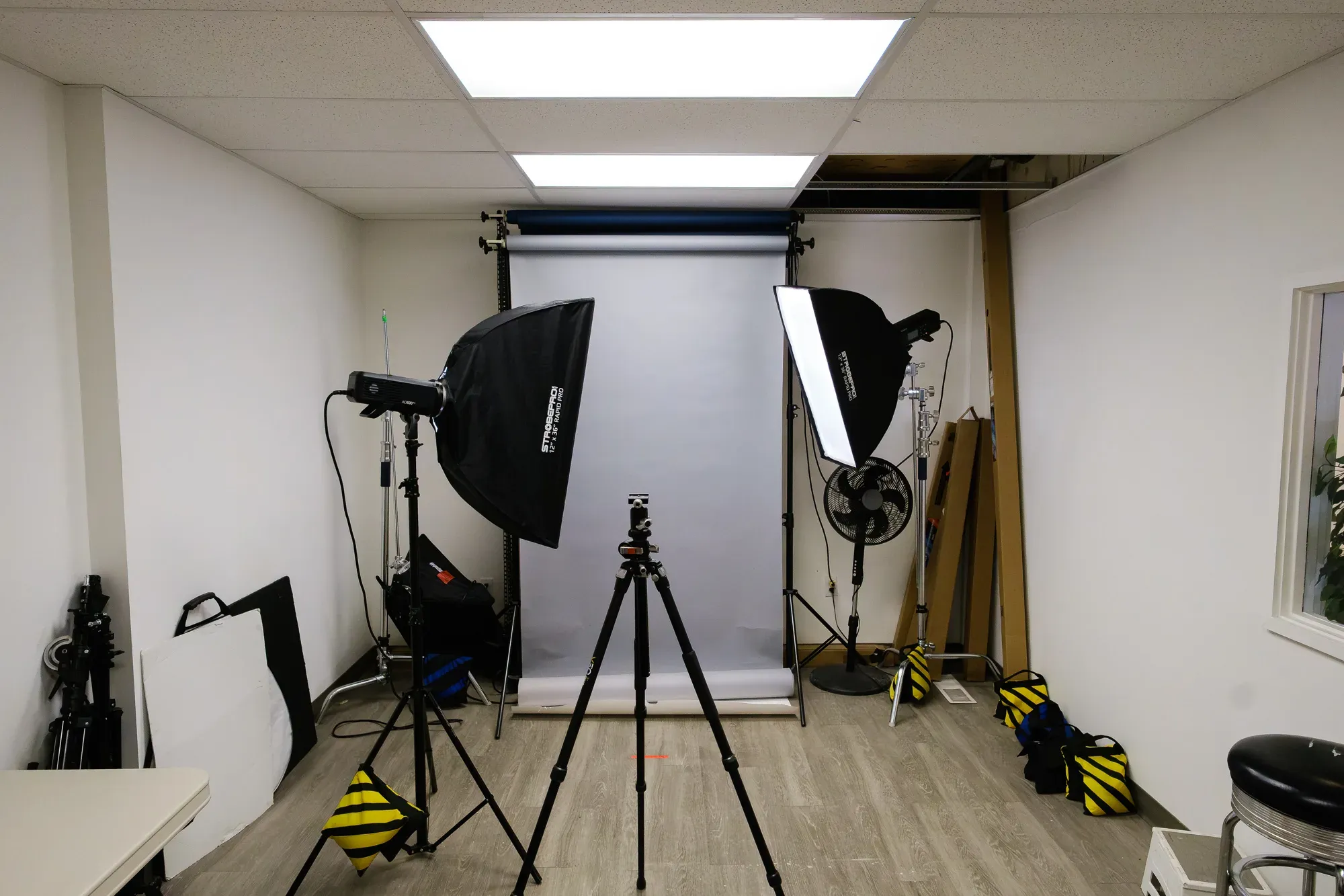 Calgary headshot studio lighting setup - softboxes and grey backdrop